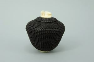 Image of baleen basket, round with flared sides, with ivory walrus finial